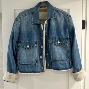 Blank NYC cropped denim jacket with Sherpa lining.